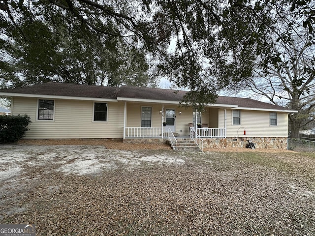 single story home with covered porch