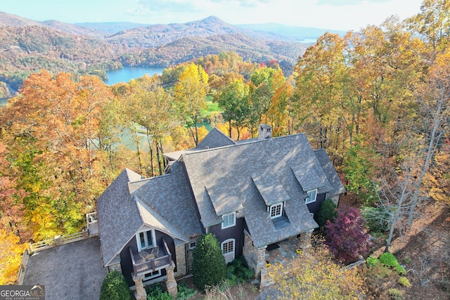 bird's eye view with a water and mountain view