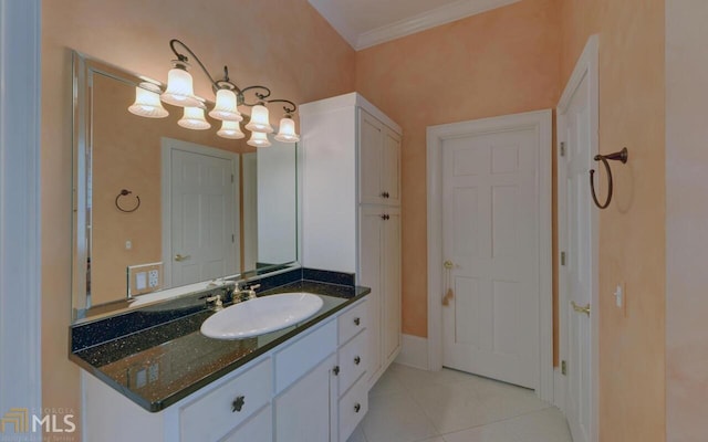 bathroom featuring vanity, ornamental molding, and tile patterned floors