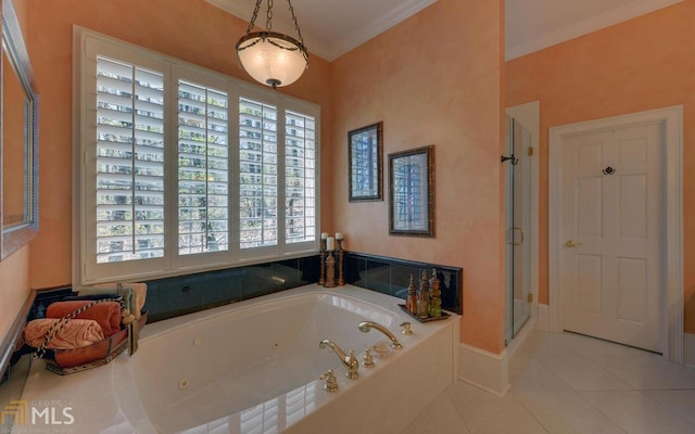 bathroom featuring ornamental molding, plenty of natural light, tile patterned floors, and separate shower and tub