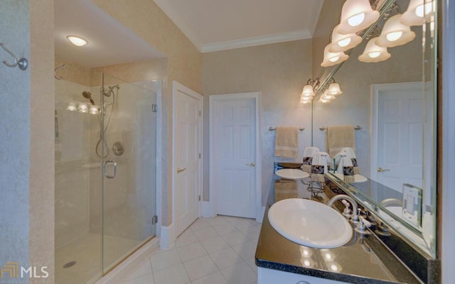 bathroom with crown molding, tile patterned floors, vanity, and a shower with shower door