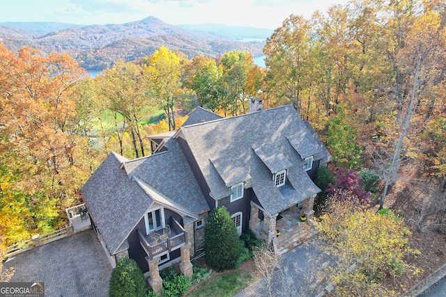 birds eye view of property featuring a mountain view