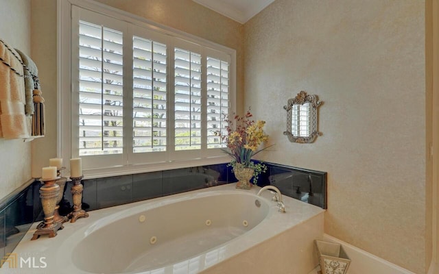 bathroom featuring tiled bath