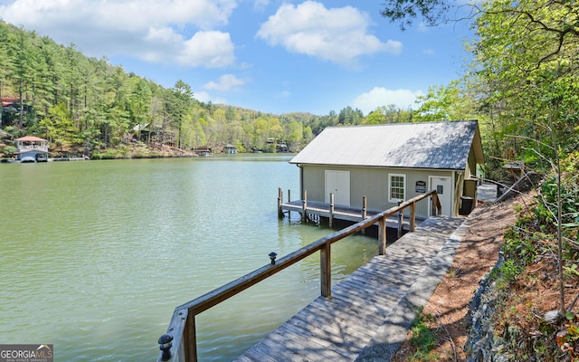 dock area featuring a water view