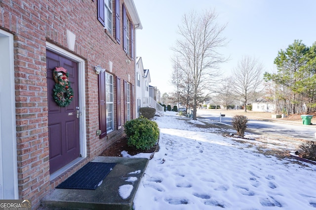 view of yard covered in snow