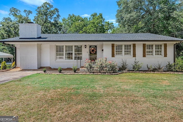 single story home with a front yard