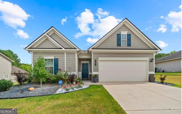 craftsman-style house featuring a garage and a front lawn