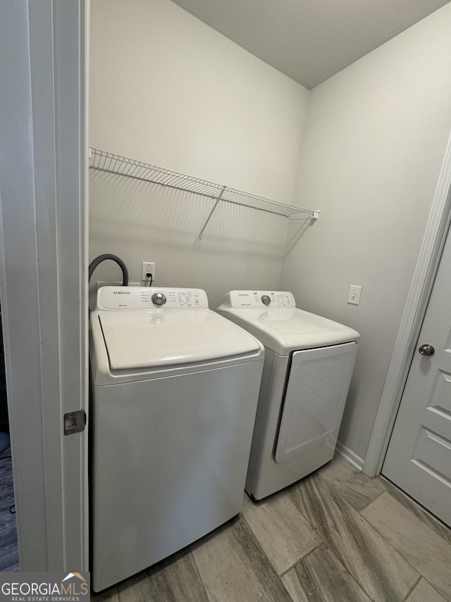 laundry area featuring separate washer and dryer