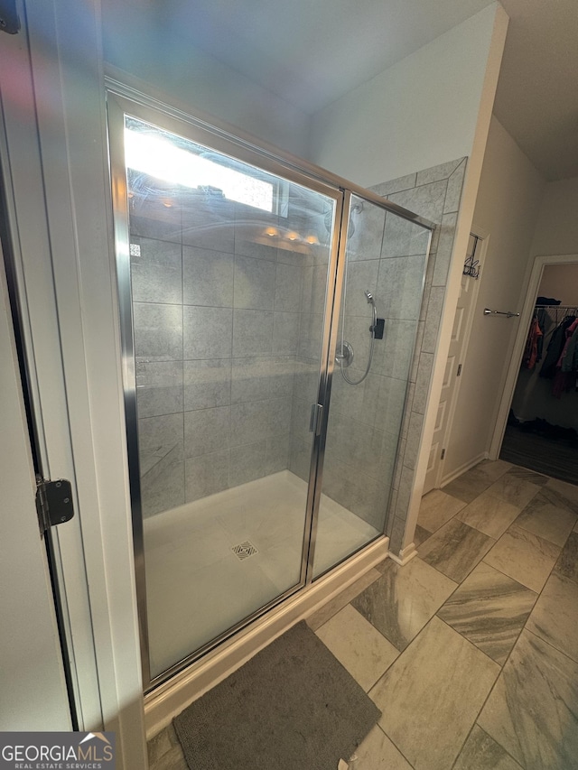 bathroom featuring walk in shower