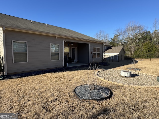 back of house with a patio area