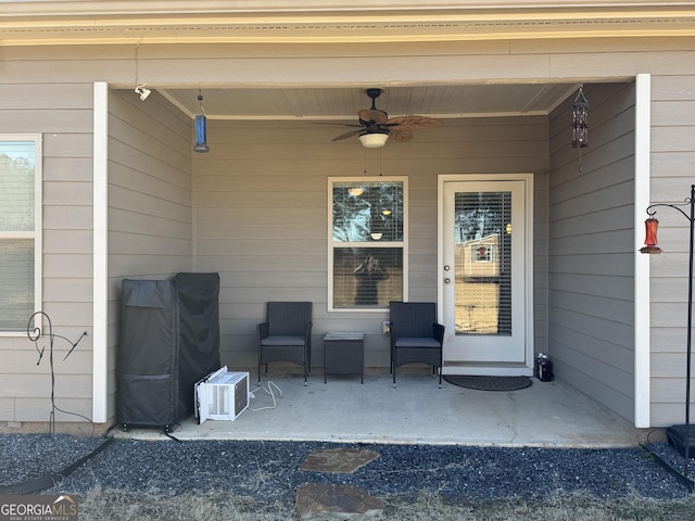 view of patio with ceiling fan