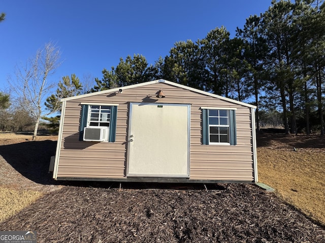 view of outbuilding with cooling unit