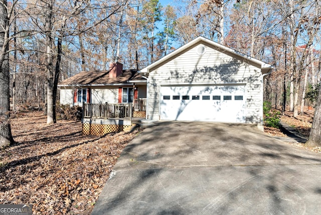 ranch-style home featuring a garage