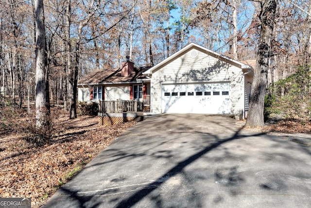 ranch-style home featuring a garage