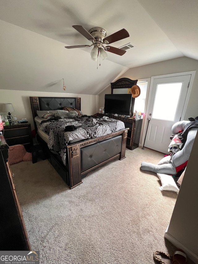 bedroom with ceiling fan, light carpet, and lofted ceiling