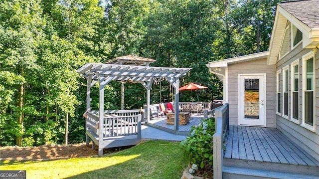 wooden terrace with a pergola, an outdoor hangout area, and a yard