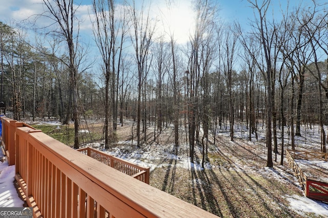 view of snow covered deck