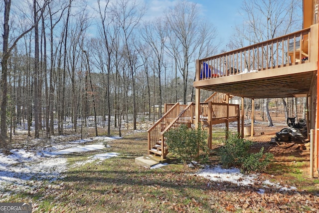 view of yard featuring a wooden deck