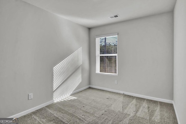 empty room with carpet floors