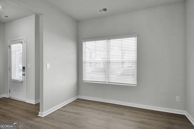 foyer entrance featuring hardwood / wood-style floors