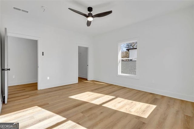 unfurnished bedroom featuring ceiling fan and light hardwood / wood-style flooring