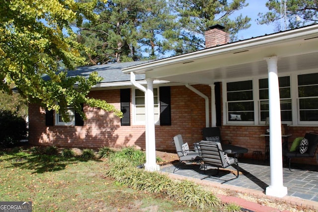 view of front of property featuring a patio area