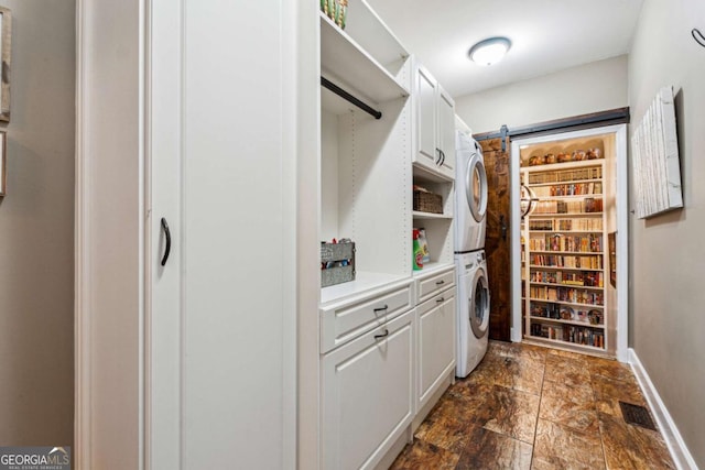 spacious closet with stacked washer and dryer