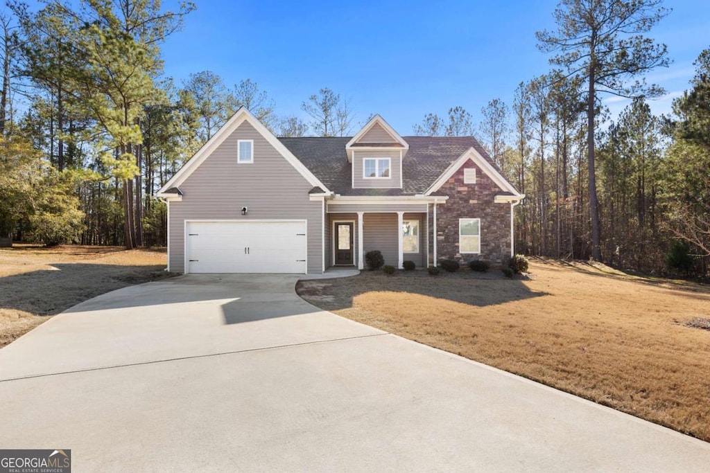 view of property featuring a front yard