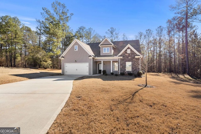 view of front facade with a front lawn and a garage