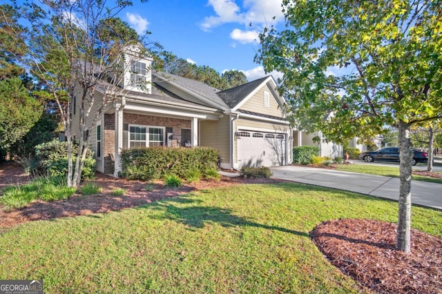 view of front facade with a front yard and a garage