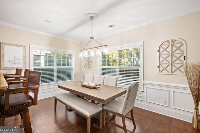 106 Danbury Ct, Pooler, GA 31322 - dining space with dark wood-type flooring, crown molding, wainscoting, and a decorative wall