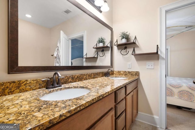 106 Danbury Ct, Pooler, GA 31322 - ensuite bathroom with double vanity and baseboards