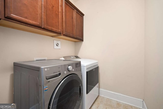 106 Danbury Ct, Pooler, GA 31322 - laundry room featuring cabinet space and washing machine and dryer