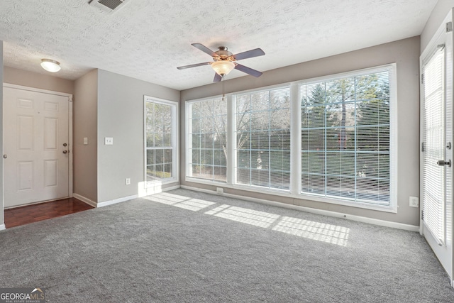 interior space featuring ceiling fan