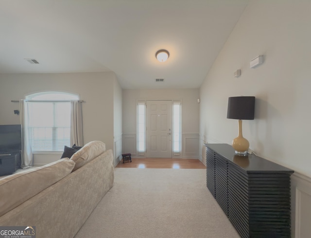 foyer with light wood-type flooring