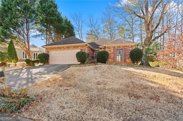 single story home with a garage