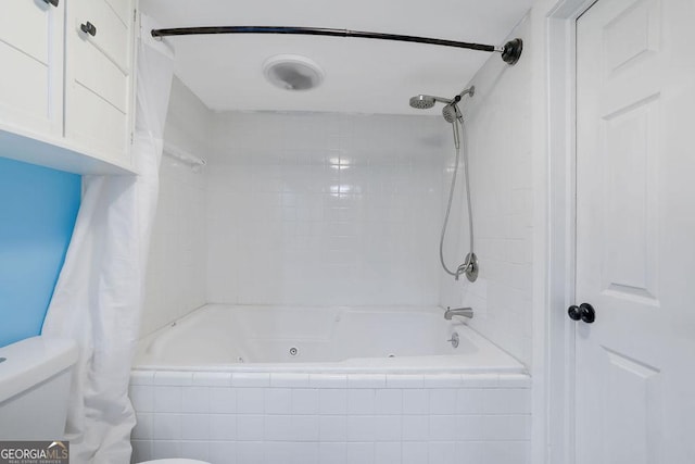 bathroom with toilet and shower / bath combination with curtain