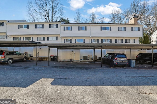 view of parking featuring a carport