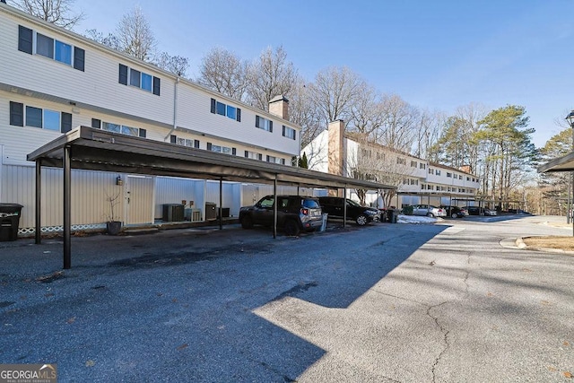 view of parking featuring a carport