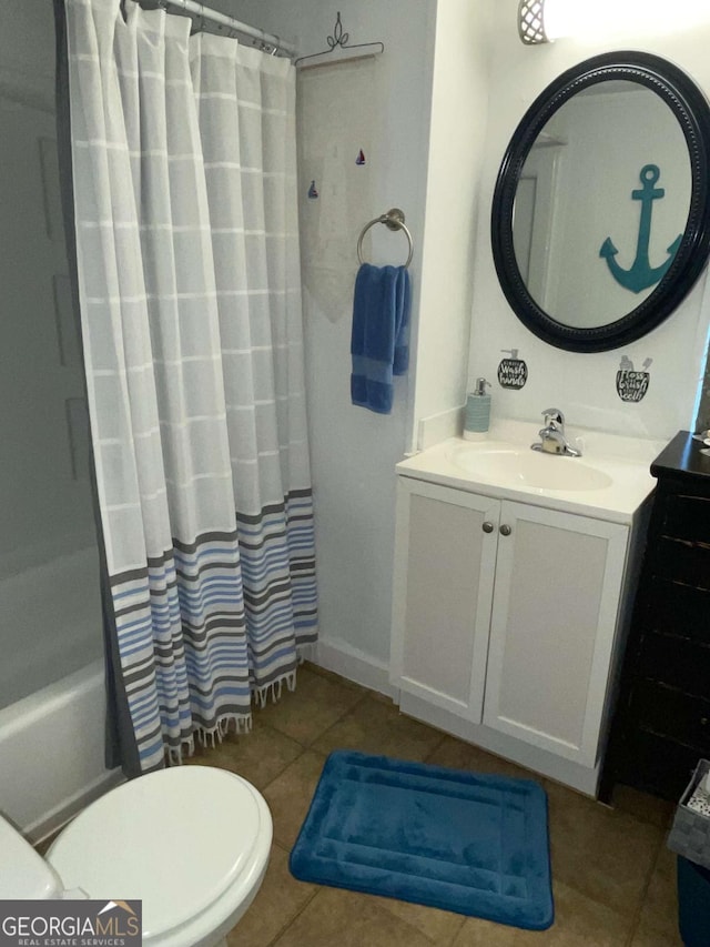 full bathroom with toilet, vanity, tile patterned floors, and shower / tub combo with curtain