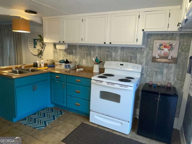 kitchen with white cabinets, white electric stove, sink, and blue cabinetry