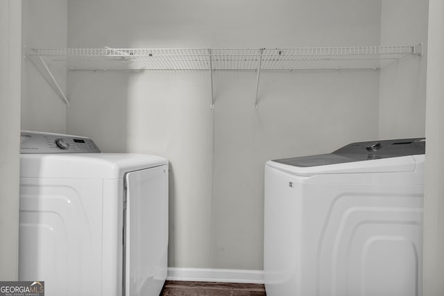 clothes washing area with washer and dryer