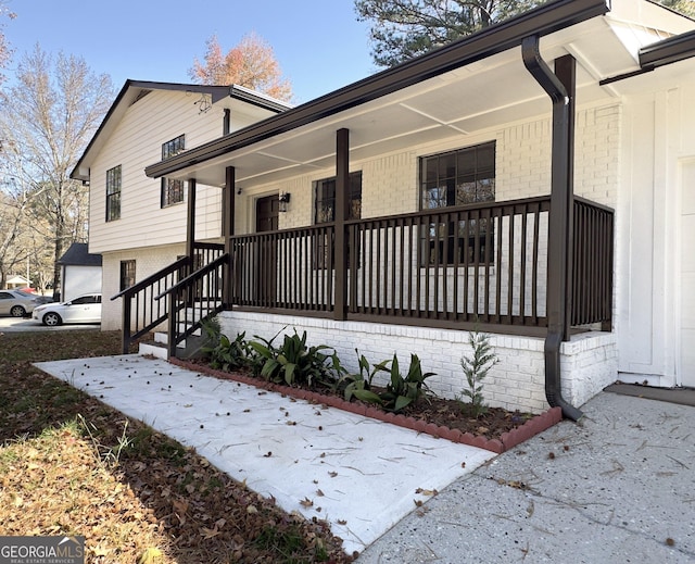 view of home's exterior featuring covered porch