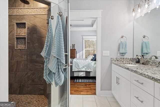 bathroom with tiled shower