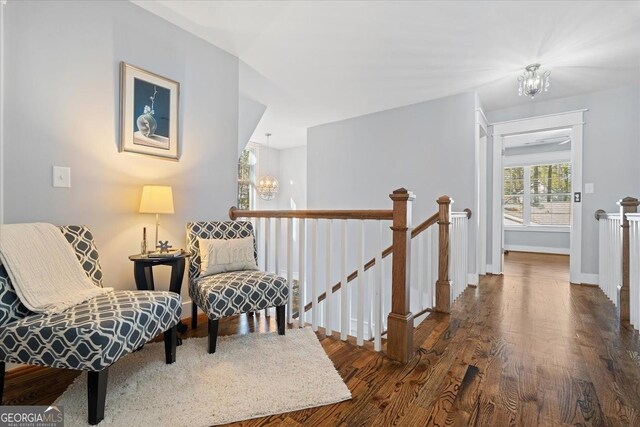 corridor featuring dark hardwood / wood-style flooring