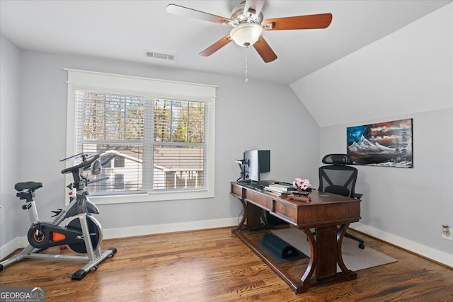 office space featuring ceiling fan, lofted ceiling, and hardwood / wood-style flooring