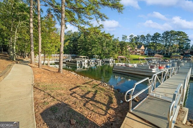 view of dock with a water view