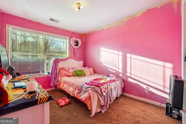 bedroom featuring carpet