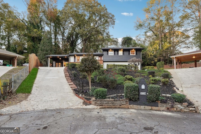 view of front of home featuring a carport