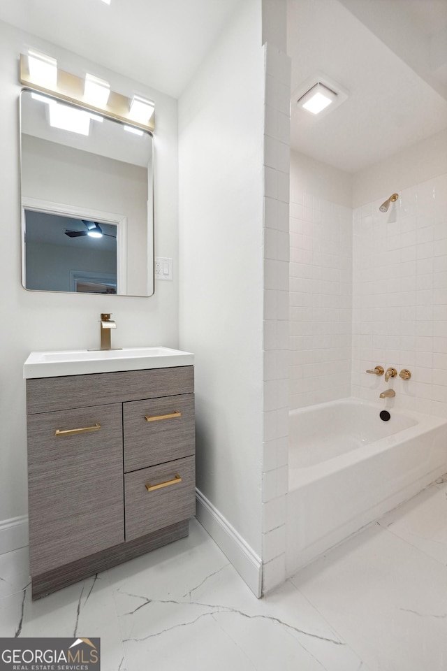 bathroom with bathtub / shower combination and vanity